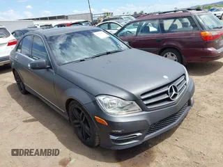 2014 Mercedes-Benz C C 250 Sport with VIN WDDGF4HB8EG238824, listed as a IAAI auction lot 42001403 with 163,458 mi miles. Bid and sale history available at carsss.com. Image 1.