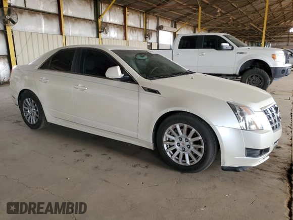 2012 Cadillac CTS with VIN 1G6DA5E52C0131731, listed as a Copart auction lot 59223235 with 104,521 mi miles and Salvage title. Bid and sale history available at DreamBid. Image 4.