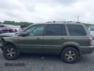 2006 Honda Pilot EX-L with VIN 5FNYF18776B011211, listed as a IAAI auction lot 39555749 with 295,998 mi miles and . Bid and sale history available at DreamBid. Image 15.