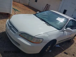 1999 Honda Accord LX z VIN JHMCG5640XC051473, wystawiony jako IAAI lot #42455960 z przebiegiem 200 284 mil mil oraz . Historia ofert i sprzedaży dostępna na DreamBid. Obrazek 2.