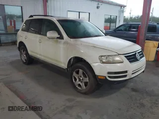 2004 Volkswagen Touareg with VIN WVGBC67L04D026451, listed as a IAAI auction lot 41859371 with 151,392 mi miles and . Bid and sale history available at DreamBid. Image 1.