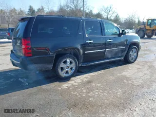 2009 Chevrolet Suburban LTZ with VIN 1GNFK36329R291320, listed as a IAAI auction lot 41393816 with 157,469 mi miles. Bid and sale history available at carsss.com. Image 4.