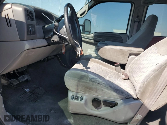 2000 Ford Super Duty F-250 XL with VIN 1FTNW21SXYEA52699, listed as a Copart auction lot 78659054 with 154,056 mi miles and Salvage Title. Bid and sale history available at carsss.com. Image 7.