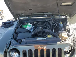 2008 Jeep Wrangler Unlimited Sahara with VIN 1J4GA59148L504608, listed as a Copart auction lot 52400325 with 123,959 mi miles and Salvage Title. Bid and sale history available at carsss.com. Image 14.