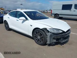 2014 Tesla Model S 60 with VIN 5YJSA1H10EFP56526, listed as a IAAI auction lot 41871784 with 143,361 mi miles and . Bid and sale history available at DreamBid. Image 1.