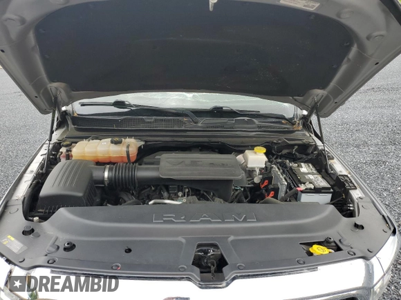 2022 Ram 1500 Big Horn z VIN 1C6RRFBGXNN278996, wystawiony jako Copart lot #55657725 z przebiegiem 65 207 mil mil oraz Czysty tytuł • Clean title. Historia ofert i sprzedaży dostępna na DreamBid. Obrazek 11.