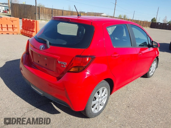 2015 Toyota Yaris L with VIN VNKKTUD38FA033446, listed as a IAAI auction lot 42014271 with 14,564 mi miles. Bid and sale history available at carsss.com. Image 4.