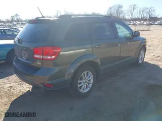 2018 Dodge Journey SXT with VIN 3C4PDCBG6JT335847, listed as a IAAI auction lot 41739617 with 124,204 mi miles. Bid and sale history available at carsss.com. Image 4.