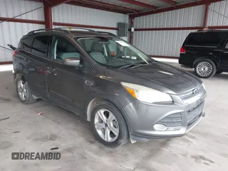 2014 Ford Escape SE with VIN 1FMCU0GXXEUC46554, listed as a IAAI auction lot 42057795 with 92,147 mi miles. Bid and sale history available at carsss.com. Image 1.