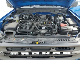 2023 Ford Bronco z VIN 1FMDE5BH7PLB11989, wystawiony jako Copart lot #58302125 z przebiegiem 25 526 mil mil oraz Szkoda całkowita • Salvage title. Historia ofert i sprzedaży dostępna na DreamBid. Obrazek 12.