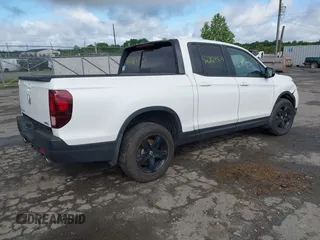 2023 Honda Ridgeline Black Edition with VIN 5FPYK3F88PB018969, listed as a IAAI auction lot 42264424 with 19,193 mi miles and . Bid and sale history available at DreamBid. Image 4.