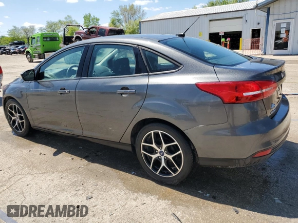 2018 Ford Focus SE z VIN 1FADP3F20JL257320, wystawiony jako Copart lot #55956435 z przebiegiem 26 919 mil mil oraz Szkoda całkowita • Salvage title. Historia ofert i sprzedaży dostępna na DreamBid. Obrazek 2.