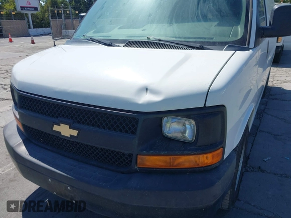 2014 Chevrolet Express Cargo with VIN 1GCSGAFXXE1200920, listed as a IAAI auction lot 42637911 with 205,182 mi miles and . Bid and sale history available at DreamBid. Image 6.