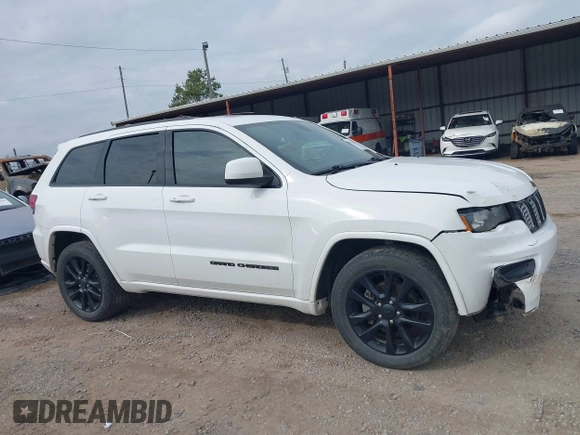2017 Jeep Grand Cherokee Altitude with VIN 1C4RJEAG9HC736362, listed as a IAAI auction lot 41437181 with 125,346 mi miles and . Bid and sale history available at DreamBid. Image 14.