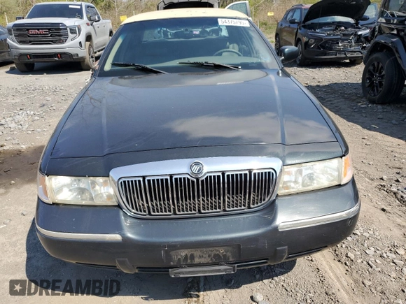 1999 Mercury Grand Marquis LS with VIN 2MEFM75W0XX731008, listed as a Copart auction lot 54375795 with 88,080 mi miles and Salvage Title. Bid and sale history available at DreamBid. Image 5.