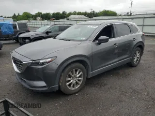 2019 Mazda CX-9 Touring z VIN JM3TCBCY7K0304664, wystawiony jako Copart lot #58710495 z przebiegiem Nie podano mil oraz Szkoda całkowita • Salvage title. Historia ofert i sprzedaży dostępna na DreamBid. Obrazek 1.