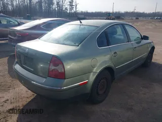 2002 Volkswagen Passat z VIN WVWPD23B42P070347, wystawiony jako IAAI lot #41546173 z przebiegiem 303 916 mil mil oraz . Historia ofert i sprzedaży dostępna na DreamBid. Obrazek 4.
