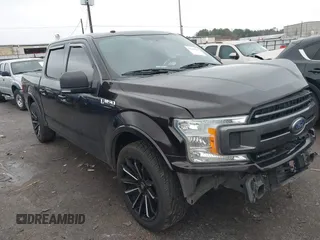 2018 Ford F-150 XL with VIN 1FTEW1CG4JFA30409, listed as a IAAI auction lot 41446639 with 165,165 mi miles. Bid and sale history available at carsss.com. Image 1.