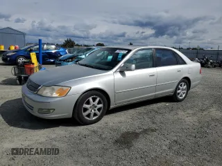 2000 Toyota Avalon XL with VIN 4T1BF28B3YU002835, listed as a Copart auction lot 50902115 with 128,699 mi miles and Salvage Title. Bid and sale history available at DreamBid. Image 1.