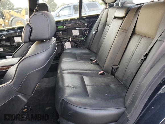 2006 BMW 7 Series 750i with VIN WBAHL83506DT05674, listed as a Copart auction lot 77176834 with 263,495 mi miles and Salvage title. Bid and sale history available at DreamBid. Image 10.