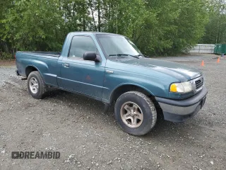 1999 Mazda B-Series Truck SX z VIN 4F4YR12CXXTM22296, wystawiony jako Copart lot #57175325 z przebiegiem 129 333 mil mil oraz Szkody całkowita. Historia ofert i sprzedaży dostępna na DreamBid. Obrazek 4.