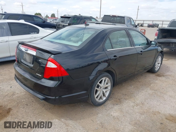 2011 Ford Fusion SEL with VIN 3FAHP0JG9BR279516, listed as a IAAI auction lot 41895984 with 184,718 mi miles. Bid and sale history available at carsss.com. Image 4.