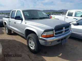 2002 Dodge Dakota SLT с VIN 1B7HG48NX2S557995, выставлен на аукционе IAAI как лот 42791890 с пробегом 193 050 миль миль и . История ставок и продаж доступна на DreamBid. Изображение 1.