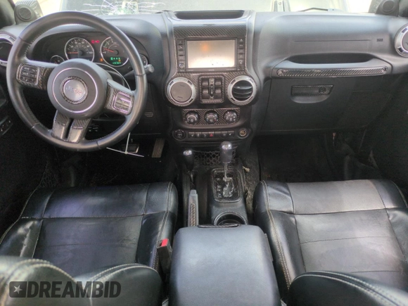 2012 Jeep Wrangler Unlimited Sahara z VIN 1C4HJWEG1CL168435, wystawiony jako Copart lot #58431615 z przebiegiem 120 364 mil mil oraz Szkoda całkowita • Salvage title. Historia ofert i sprzedaży dostępna na DreamBid. Obrazek 8.