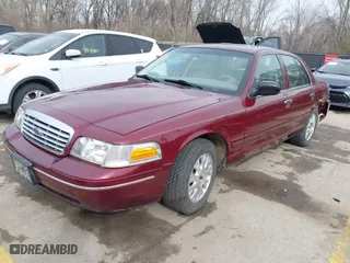 2005 Ford Crown Victoria LX with VIN 2FAFP74W25X106106, listed as a IAAI auction lot 41825793 with 175,740 mi miles. Bid and sale history available at carsss.com. Image 2.