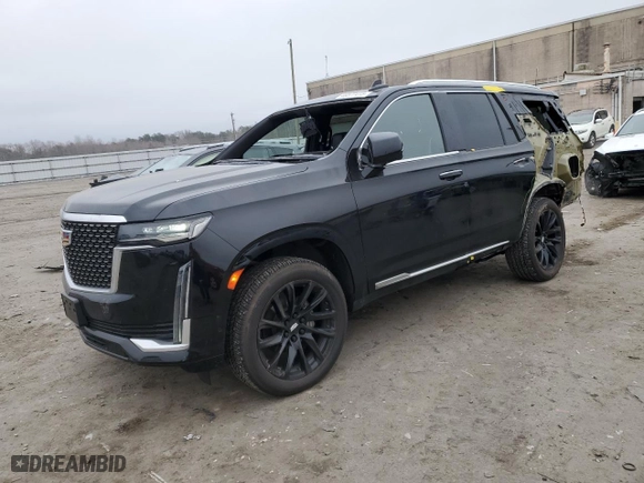 2021 Cadillac Escalade Premium Luxury with VIN 1GYS4BKL9MR215159, listed as a Copart auction lot 48577415 with 50,773 mi miles and Salvage Title. Bid and sale history available at carsss.com. Image 1.