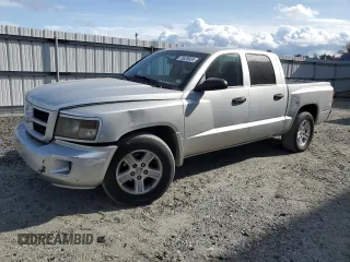2009 Dodge Dakota Bighorn/Lonestar z VIN 1D7HE38K69S782887, wystawiony jako Copart lot #75825924 z przebiegiem 221 134 mil mil oraz Szkoda całkowita • Salvage title. Historia ofert i sprzedaży dostępna na DreamBid. Obrazek 1.
