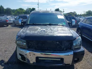 2005 Nissan Titan LE with VIN 1N6AA07B05N509859, listed as a IAAI auction lot 42662424 with 252,000 mi miles and . Bid and sale history available at DreamBid. Image 13.