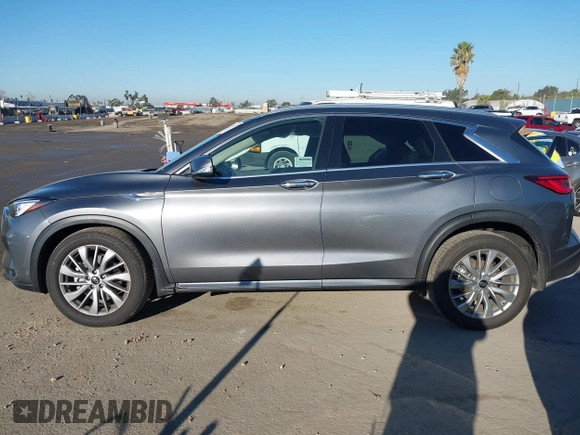 2024 Infiniti QX50 Luxe with VIN 3PCAJ5BAXRF104014, listed as a IAAI auction lot 41647475 with 7,771 mi miles and . Bid and sale history available at DreamBid. Image 14.