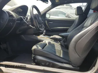 2011 BMW 1 Series 135i with VIN WBAUC9C59BVM10528, listed as a Copart auction lot 61499025 with 160,557 mi miles and Salvage title. Bid and sale history available at DreamBid. Image 7.