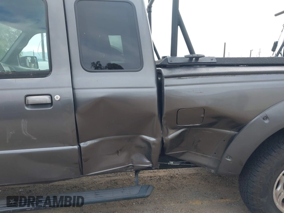 2011 Ford Ranger XL with VIN 1FTKR1EE4BPA46997, listed as a IAAI auction lot 41471483 with 217,874 mi miles. Bid and sale history available at carsss.com. Image 6.