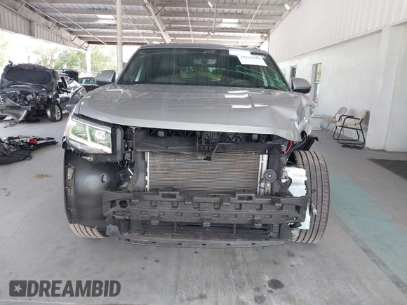 2021 Volkswagen Atlas SEL с VIN 1V2EE2CA9MC216892, выставлен на аукционе IAAI как лот 39943648 с пробегом 54 920 миль миль и . История ставок и продаж доступна на DreamBid. Изображение 13.