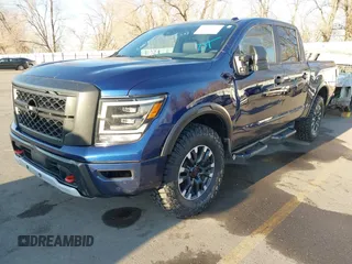 2021 Nissan Titan Pro-4X z VIN 1N6AA1ED1MN517476, wystawiony jako IAAI lot #41422217 z przebiegiem 62 650 mil mil oraz . Historia ofert i sprzedaży dostępna na DreamBid. Obrazek 17.