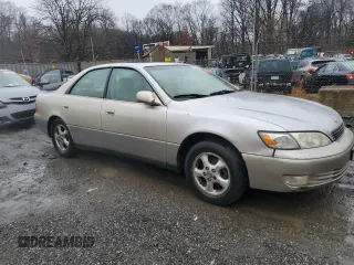 1999 Lexus ES 300 Luxury Sport Sdn with VIN JT8BF28GXX5067205, listed as a Copart auction lot 83018394 with 170,573 mi miles and Salvage Title. Bid and sale history available at carsss.com. Image 4.