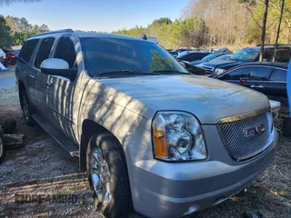 2011 GMC Yukon XL Denali with VIN 1GKS2MEF0BR102845, listed as a IAAI auction lot 41886377 with 210,991 mi miles. Bid and sale history available at carsss.com. Image 1.