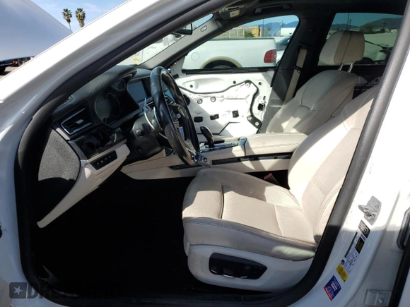 2014 BMW 7 Series 750i с VIN WBAYA8C56ED825303, выставлен на аукционе Copart как лот 46189695 с пробегом 77 573 миль миль и Списание • Salvage title. История ставок и продаж доступна на DreamBid. Изображение 7.