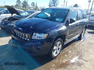 2011 Jeep Compass with VIN 1J4NF1FB6BD180447, listed as a IAAI auction lot 41575014 with 130,694 mi miles. Bid and sale history available at carsss.com. Image 17.