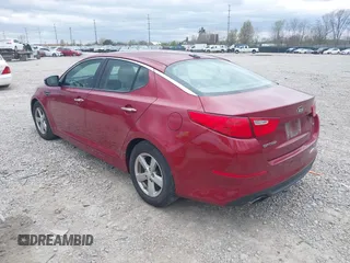 2015 Kia Optima LX with VIN 5XXGM4A7XFG446248, listed as a IAAI auction lot 42047807 with 167,000 mi miles. Bid and sale history available at carsss.com. Image 3.
