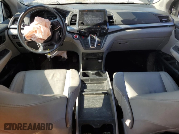 2019 Honda Odyssey EX-L with VIN 5FNRL6H70KB025729, listed as a Copart auction lot 46331235 with 123,682 mi miles and Salvage Title. Bid and sale history available at carsss.com. Image 8.