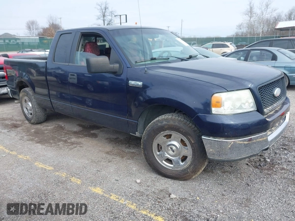 2005 Ford F-150 XLT with VIN 1FTPX12565NA61341, listed as a IAAI auction lot 41693609 with 401,988 mi miles. Bid and sale history available at carsss.com. Image 1.
