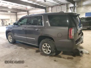 2015 GMC Yukon Denali with VIN 1GKS2CKJ2FR677604, listed as a Copart auction lot 51714505 with 146,648 mi miles and Salvage Title. Bid and sale history available at carsss.com. Image 2.