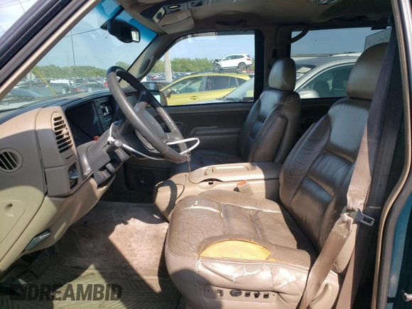 1998 GMC Yukon with VIN 1GKEK13RXWJ723572, listed as a Copart auction lot 65987314 with 237,503 mi miles and Salvage Title. Bid and sale history available at carsss.com. Image 7.