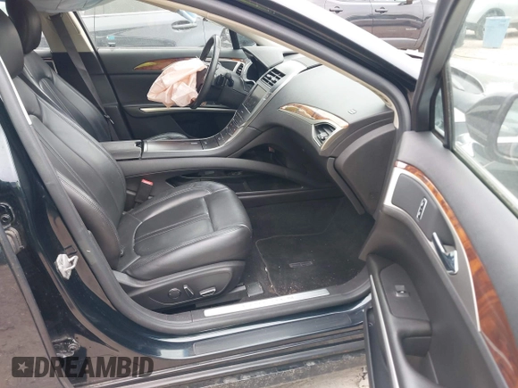 2014 Lincoln MKZ with VIN 3LN6L2G97ER804381, listed as a IAAI auction lot 42277543 with 120,907 mi miles and . Bid and sale history available at DreamBid. Image 5.