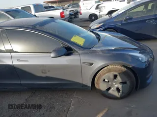 2022 Tesla Model 3 Long Range with VIN 5YJ3E1EB3NF264532, listed as a IAAI auction lot 41842044 with 42,280 mi miles and . Bid and sale history available at DreamBid. Image 12.