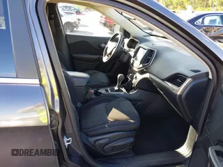 2016 Jeep Cherokee Altitude with VIN 1C4PJLCSXGW363598, listed as a IAAI auction lot 41670125 with 135,603 mi miles. Bid and sale history available at carsss.com. Image 5.