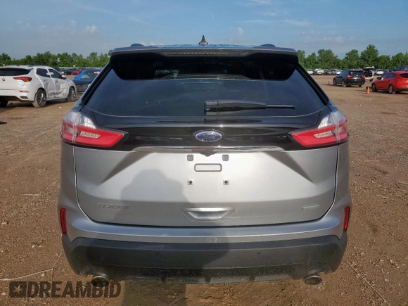 2020 Ford Edge SE with VIN 2FMPK3G94LBA35234, listed as a Copart auction lot 61189905 with 33,013 mi miles and Salvage title. Bid and sale history available at DreamBid. Image 6.